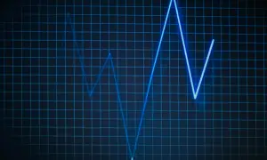 Niebieska linia na siatce, przypominająca wykres EKG, pokazuje zmienność, jakby odzwierciedlała puls życia lub dynamikę **biosotal** w organizmie.